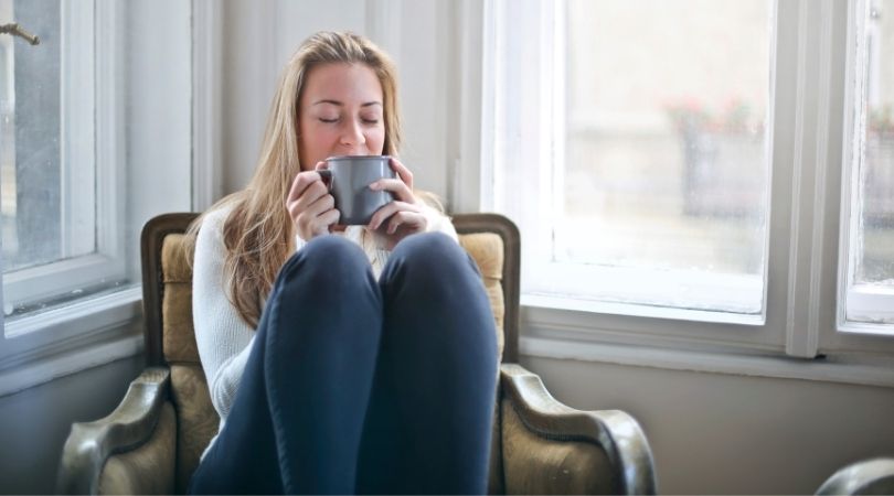 Tenant Drinking From Mug