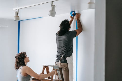 Couple Fixing Up House