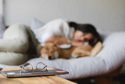 Woman Sleeping With Pet